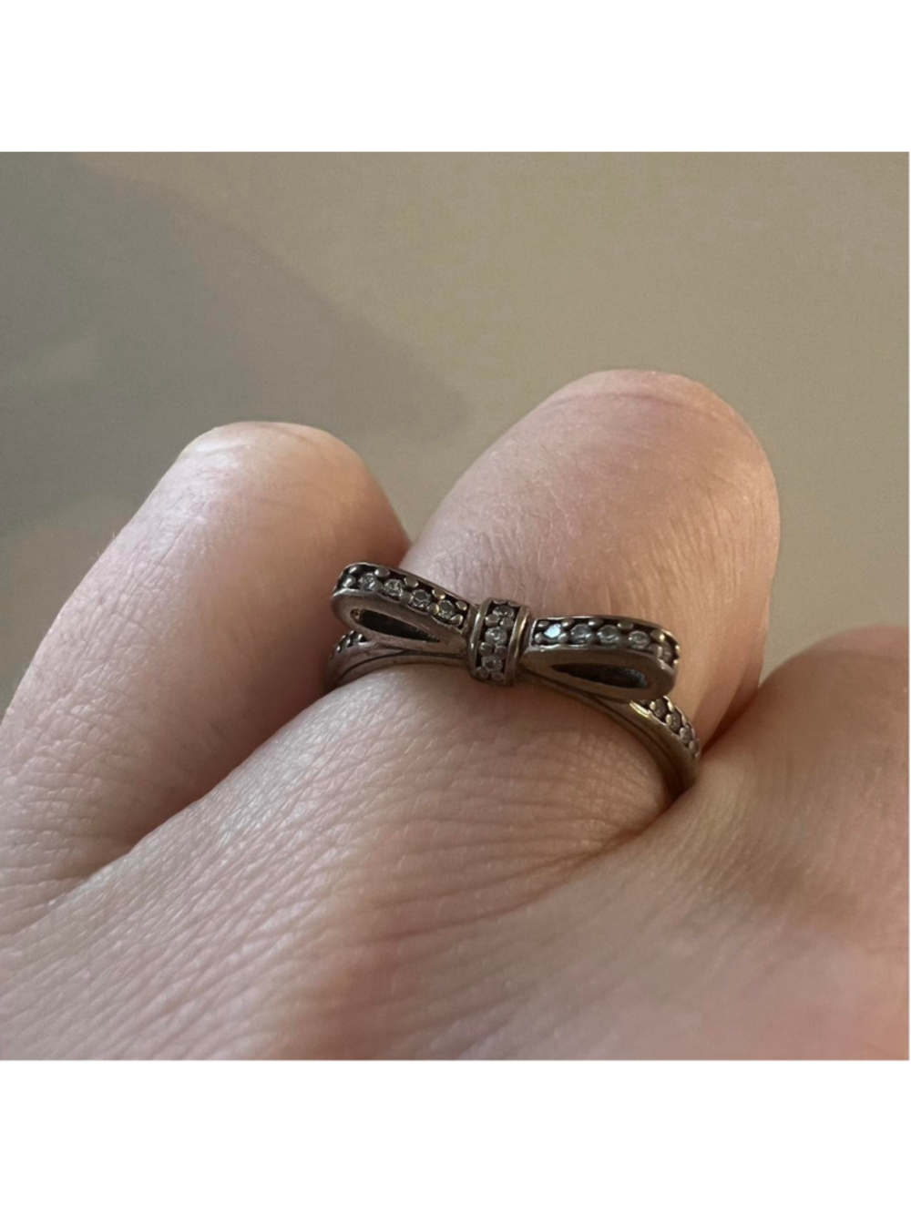Pandora 925 sterling silver ring with bow design and crystals